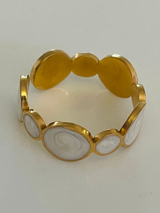 White circles gold ring