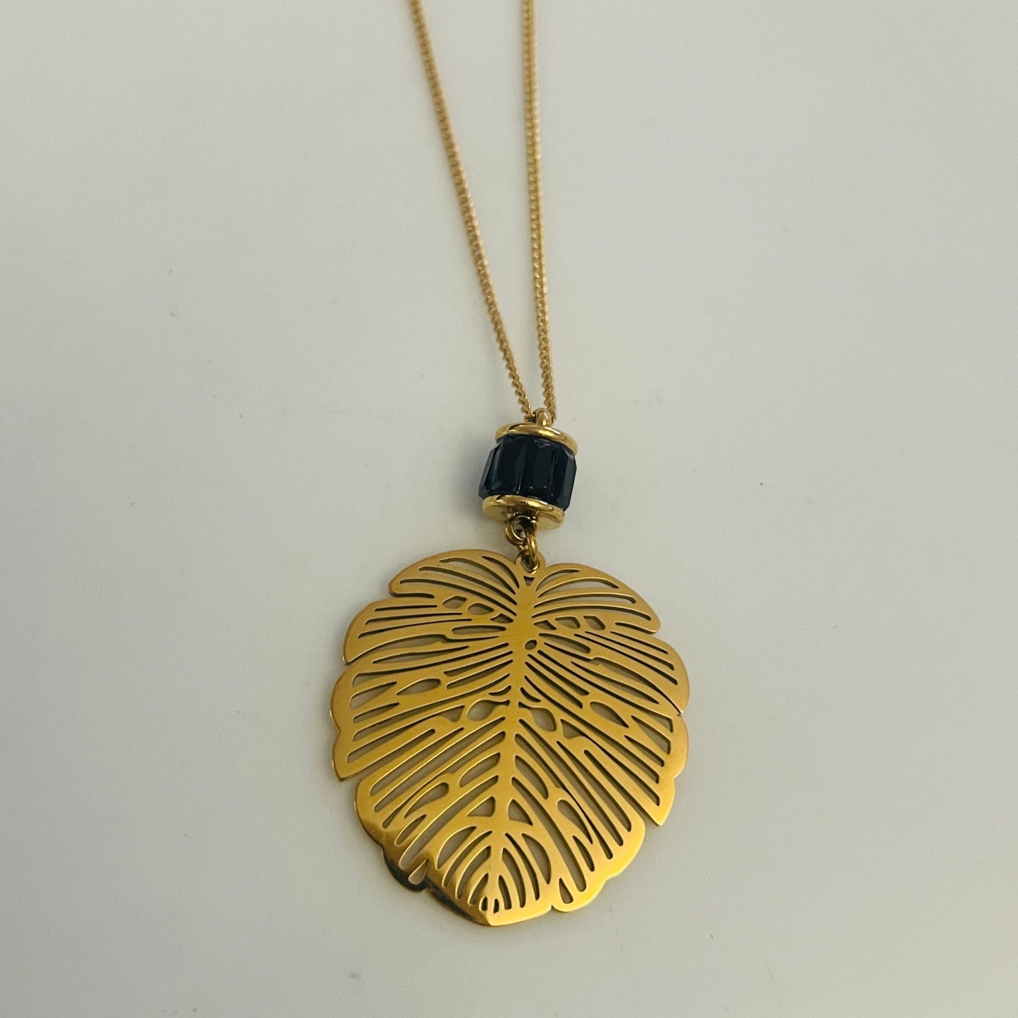 Black and gold leaf necklace